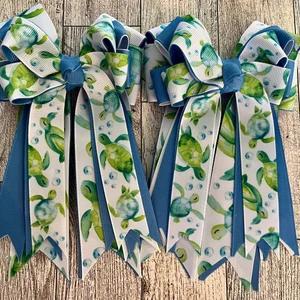 Ocean Blue Turtles Show Bows